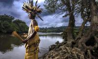 Gabon - Village Chief Jerome Likassou is seen in his traditional wear. © Brent Stirton/Getty Images for FAO, CIRAD, CIFOR, WCS