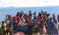 Children playing on the beach. File Swm