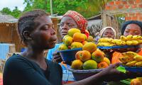 Street vendors of fruit and vegetables. 123rf