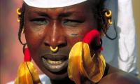 A Fulani woman wearing beautiful earrings. This ethnic group makes up almost 13% of the population of Mali.