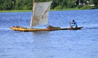 Traditional Boat on Tropical River Volta. Photo: Mirko Delazzari