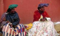 Herero women. The most distinctive feature of Herero women's dress is their horizontal horned headdress, the otjikaiva, which is a symbol of respect.   Photo: Archive Swm